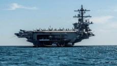 حاملة طائرات أميركية تصل الشرق الأوسط وإيران تتعهد الرد على أي هجوم